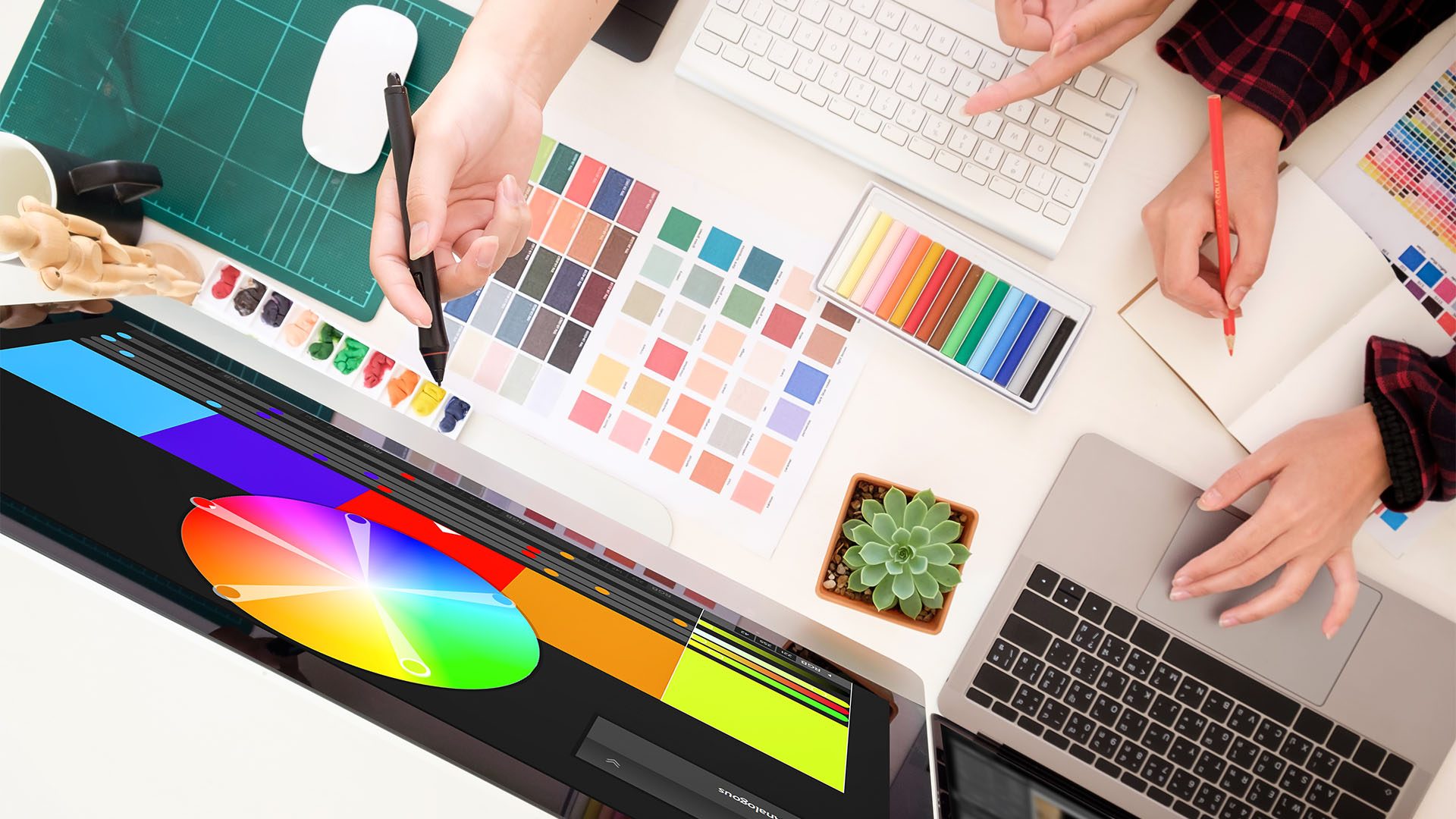 Team of graphic designers working on a computer in officeIdeas C